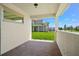 View of the well maintained backyard from the brick-paved covered patio at 8106 Mabury Ln, Orlando, FL 32832
