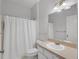 Neutral bathroom with a shower-tub combo, a vanity with a sink, and modern lighting at 917 Dekleva Dr, Apopka, FL 32712