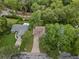 Aerial view of a home surrounded by lush greenery and mature trees at 938 Southridge Trl, Altamonte Springs, FL 32714