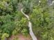 Overhead of paved walking path surrounded by lush green trees and foliage at 938 Southridge Trl, Altamonte Springs, FL 32714