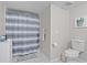 Bathroom with a shower-tub combo and white-tile flooring at 938 Southridge Trl, Altamonte Springs, FL 32714