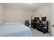 Bedroom featuring a large bed, carpet floors, and a large work space at 938 Southridge Trl, Altamonte Springs, FL 32714