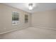 Carpeted bedroom with windows and neutral paint colors at 938 Southridge Trl, Altamonte Springs, FL 32714