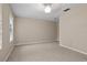 Spacious carpeted bedroom with a ceiling fan and neutral paint color at 938 Southridge Trl, Altamonte Springs, FL 32714