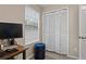 Bedroom featuring a desk, large window, carpet floors and a large closet at 938 Southridge Trl, Altamonte Springs, FL 32714