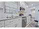 Updated kitchen featuring white cabinets, stainless steel appliances, and modern countertops at 938 Southridge Trl, Altamonte Springs, FL 32714