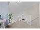 Bright loft with carpet flooring, a high ceiling, and natural light at 938 Southridge Trl, Altamonte Springs, FL 32714