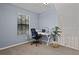 Bright office with carpet flooring, a large window, and a vaulted ceiling at 938 Southridge Trl, Altamonte Springs, FL 32714
