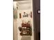 Hallway decorated with an art shelf, paintings, and a mirror at 1022 Love Ln # 35, Apopka, FL 32703