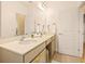 Bright bathroom features double vanity, modern fixtures, and plenty of counter space at 10293 Ebb Tide Ln, Orlando, FL 32821