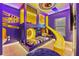 Minion themed bedroom with custom bunk bed, slide, and unique ceiling at 10293 Ebb Tide Ln, Orlando, FL 32821