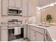 Well-appointed kitchen showcasing modern appliances, sleek countertops, and stylish finishes for cooking enjoyment at 10293 Ebb Tide Ln, Orlando, FL 32821