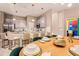Beautifully designed kitchen with counter seating, modern lighting, and stainless steel appliances perfect for gatherings at 10293 Ebb Tide Ln, Orlando, FL 32821