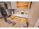 Modern kitchen with sleek countertops, stainless steel appliances, and smart storage solutions offers convenience and style at 10293 Ebb Tide Ln, Orlando, FL 32821