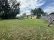 Expansive backyard featuring a fenced perimeter and a swimming pool at 108 Country Club Cir, Sanford, FL 32771