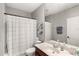 This bathroom has a shower and tub combination, vanity and toilet at 11425 Claymont Cir, Windermere, FL 34786