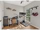 Functional office space with a window, treadmill, and shelves at 11425 Claymont Cir, Windermere, FL 34786