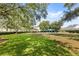 Neighborhood playground with swings and a shaded picnic area at 11425 Claymont Cir, Windermere, FL 34786