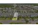 Aerial view of a residential neighborhood showcasing one of the townhomes with well-maintained landscaping at 12015 Prologue Ave, Orlando, FL 32832