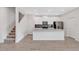 Kitchen featuring a central island, stainless steel appliances, and modern finishes at 12015 Prologue Ave, Orlando, FL 32832