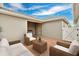 Relax on this outdoor patio, equipped with comfortable seating and a built-in grill at 12015 Prologue Ave, Orlando, FL 32832