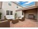 Entertain on this outdoor patio, equipped with comfortable seating and a built-in grill at 12015 Prologue Ave, Orlando, FL 32832