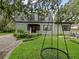Inviting two-story home with manicured landscaping and a quaint walkway to the front door at 1227 Golden Ln, Orlando, FL 32804