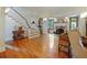 Spacious living room with hardwood floors, fireplace and staircase at 1227 Golden Ln, Orlando, FL 32804