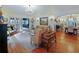 Bright living room with hardwood floors, a chandelier, and an open layout at 1227 Golden Ln, Orlando, FL 32804