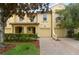 Charming townhome with a paver driveway, well-kept landscaping, and attached garage at 1277 Blessing St, Maitland, FL 32751