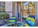 Relaxing patio with colorful chairs overlooking the neighborhood at 145 Oyster Bay Cir # 140, Altamonte Springs, FL 32701