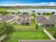 Aerial view of home with a large green backyard in a lake community at 1540 Orange Valley Rdg, Ocoee, FL 34761