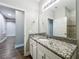 Bathroom with granite countertop vanity, undermount sink and modern fixtures at 1540 Orange Valley Rdg, Ocoee, FL 34761