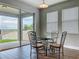 Dining area features an outside view, tile flooring, and a sliding glass door entrance at 1540 Orange Valley Rdg, Ocoee, FL 34761