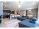 This home features an open floor plan, connecting the modern kitchen, living, and dining areas at 16061 Blue Wave Way, Clermont, FL 34714