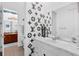 Stylish bathroom featuring a single sink vanity with designer decor and a contemporary design at 16120 Bristol Lake Cir, Orlando, FL 32828