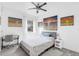 Cozy bedroom with natural light, modern decor, and wood-look floors. Perfect for relaxing and resting at 16120 Bristol Lake Cir, Orlando, FL 32828