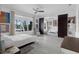 Bright bedroom with large windows, ceiling fan, closet with mirrored doors and access to backyard at 16120 Bristol Lake Cir, Orlando, FL 32828