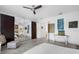 Bright bedroom with gray plank floors, dark closet, and a contemporary design scheme at 16120 Bristol Lake Cir, Orlando, FL 32828