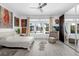 Spacious bedroom with large windows, lots of natural light, and artistic decor at 16120 Bristol Lake Cir, Orlando, FL 32828