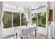 Bright dining room with a large window showcasing the green outdoors, perfect for Gathering gatherings at 16120 Bristol Lake Cir, Orlando, FL 32828