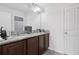 Bathroom with double sink vanity and granite countertop at 16440 Centipede St, Clermont, FL 34714