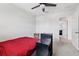 This bedroom features neutral walls, carpeted floor, and ceiling fan at 16440 Centipede St, Clermont, FL 34714