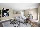 Inviting living room featuring stylish decor, modern furnishings, and hardwood floors at 201 Hammock Dunes Pl, Orlando, FL 32828