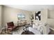 Comfortable living room featuring sleek furniture, modern decor, and a flat-screen television at 201 Hammock Dunes Pl, Orlando, FL 32828