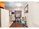 The efficient kitchen area has bar stool seating and ample natural lighting at 2044 W Gore St, Orlando, FL 32805