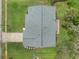Aerial view of the home's roof, lawn, and surrounding landscaping at 2050 Anne Cir, South Daytona, FL 32119