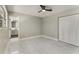 Bright, spacious bedroom featuring modern flooring, neutral walls, and a closet at 2050 Anne Cir, South Daytona, FL 32119
