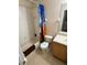 Tidy bathroom features a tub and shower and a tiled floor at 223 Palermo St, Davenport, FL 33897
