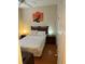 Bedroom featuring a bed with a ceiling fan and nightstands at 223 Palermo St, Davenport, FL 33897